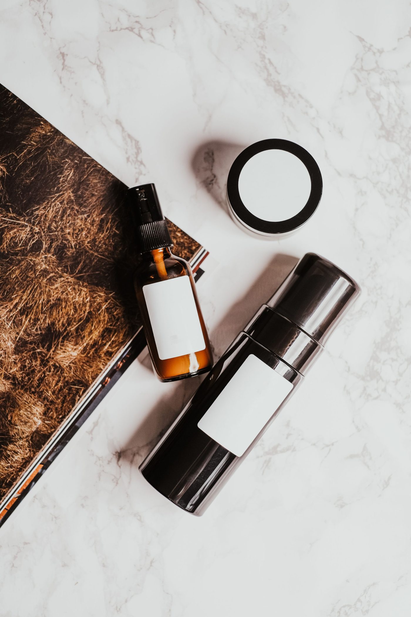 Skin care packaging on a white marble surface