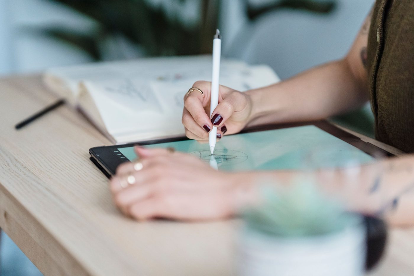 Designer sketching on a tablet